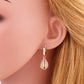 Rose Gold Renaissance-Style Earrings with Zirconia Gemstones